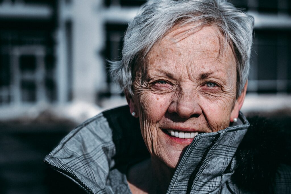 Photograph of a smiling woman to show an aspect of home care in the Colne Valley Huddersfield Kirklees